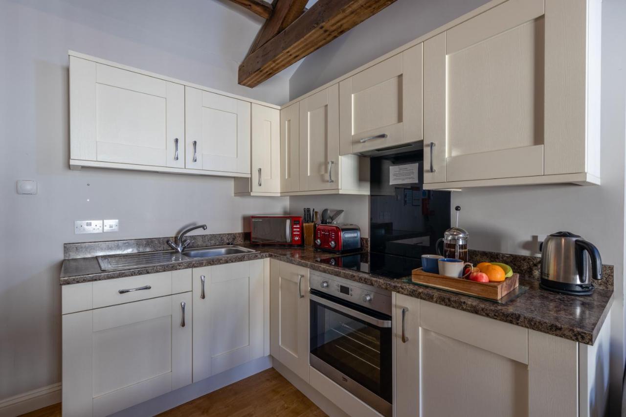 Brampton Holiday Homes - The Mews Apartment ภายนอก รูปภาพ